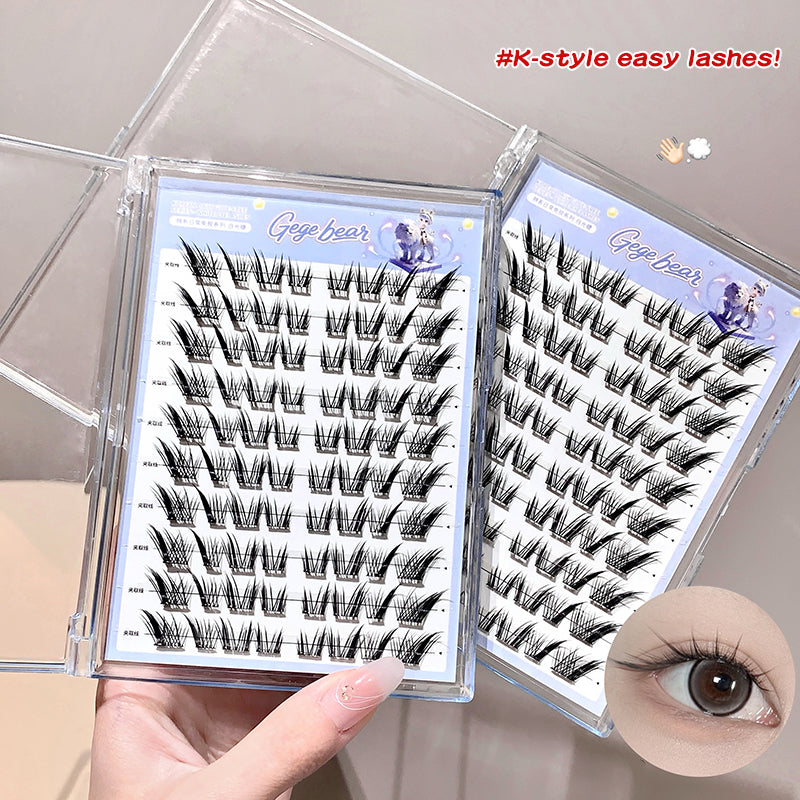 False eyelashes in a clear case with a hand holding it, showing an inset of an eye wearing the lashes.