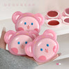 Pink bear-shaped containers held in a hand with 'GEGEBEAR' branding.