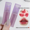 Two purple lip gloss tubes with a close-up of lips wearing the product.