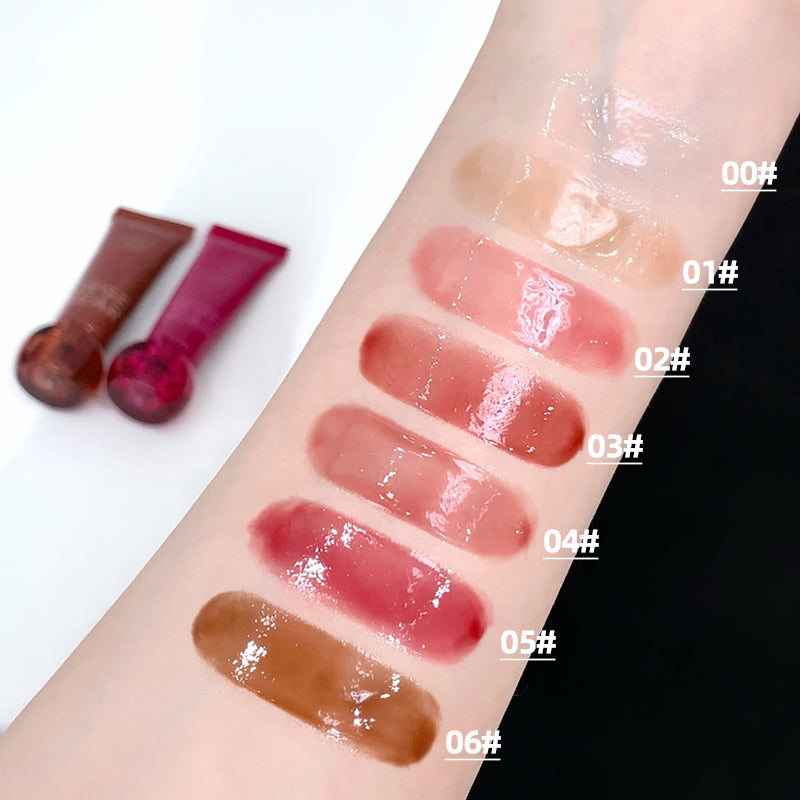Lipstick swatches on a person's arm with labeled colors