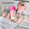 Hand holding a pink and white cosmetic product with a close-up of an eye and text 'Sweet girl vibe!' in the background.