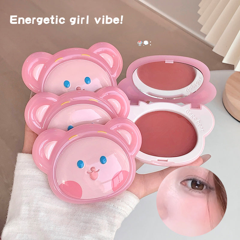 Pink bear-shaped blush compact held by a person with 'Energetic girl vibe!' text.