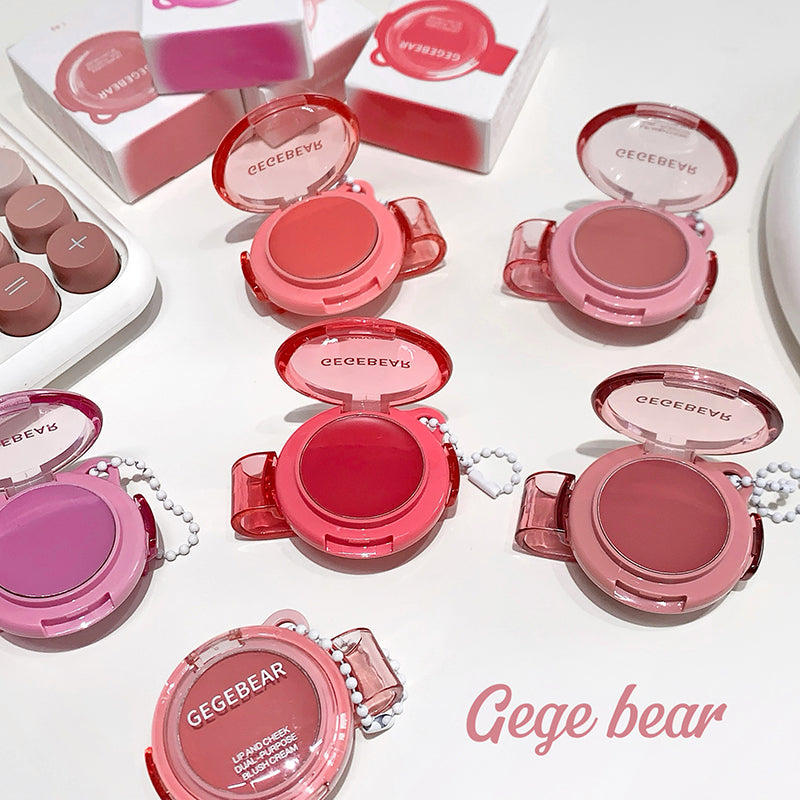 Pink makeup products with 'GEGEBEAR' branding on a white background