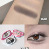 Makeup swatches and eye makeup application with a compact mirror on a neutral background.