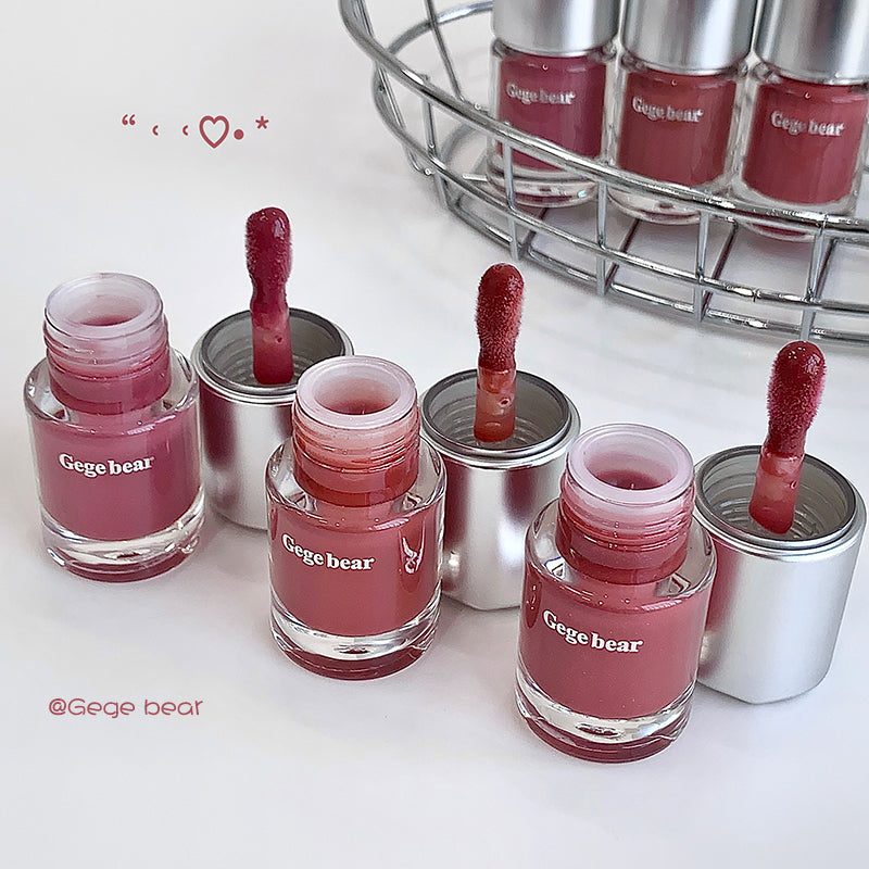 Pink nail polish bottles with visible brand name 'Gege bear' on a white background.