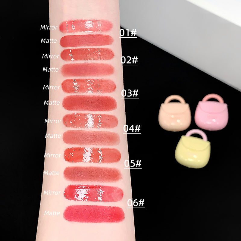 Lipstick swatches on a hand with color codes and small pastel lock-shaped containers.