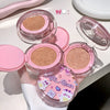Compact powder with pink case and cartoon designs on a white background