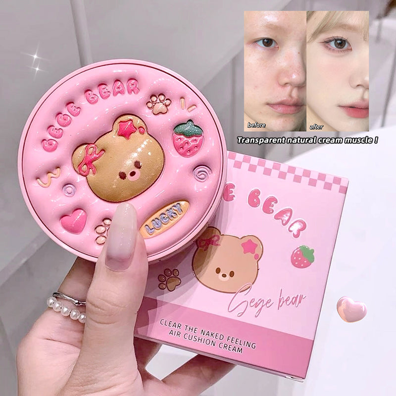 Pink cosmetic case with bear design and packaging on a white background