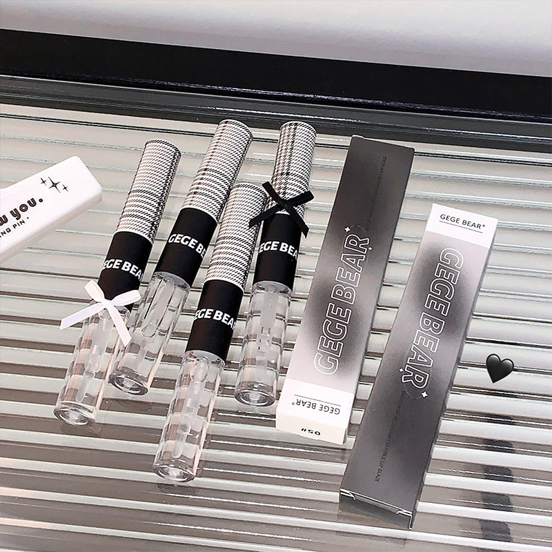 GEGE BEAR products including vials and packaging on a metallic surface