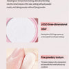 Baking process of lotion substrate with three-dimensional relief and fine powdery texture on a pink background.