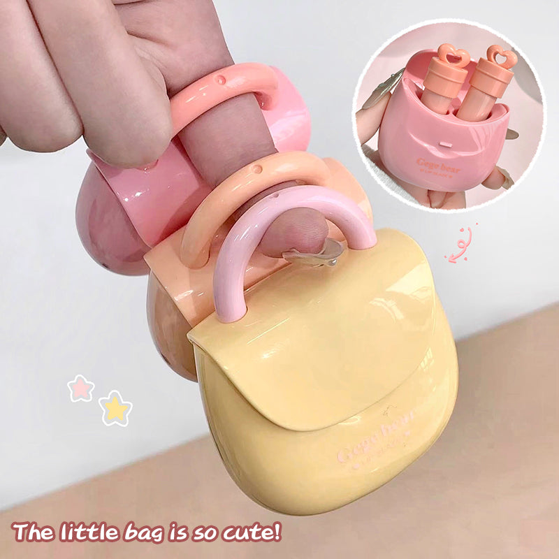 Small pink and yellow bag with a ring holder on a light background