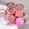 Pink makeup products with visible brand name on a white background