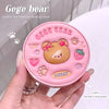 Pink Gege Bear cushion cream container held by a hand with a white background
