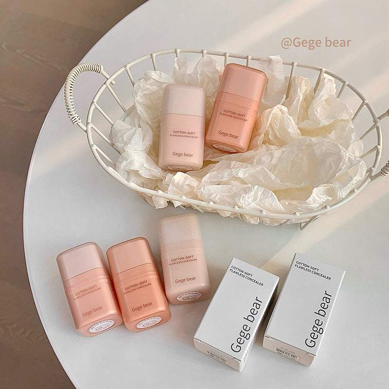 Cosmetic bottles and boxes labeled 'Gege bear' on a white surface with a neutral background.