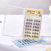 Eyelash extension set with a clear stand on a white background