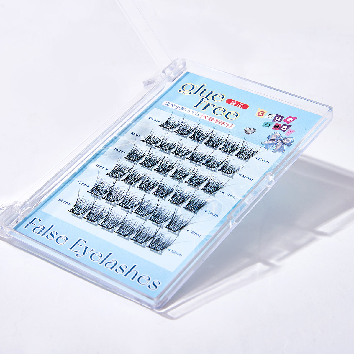 False eyelashes in a clear case with a blue label on a white background