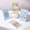 False eyelashes packaging with mermaid design on a white background