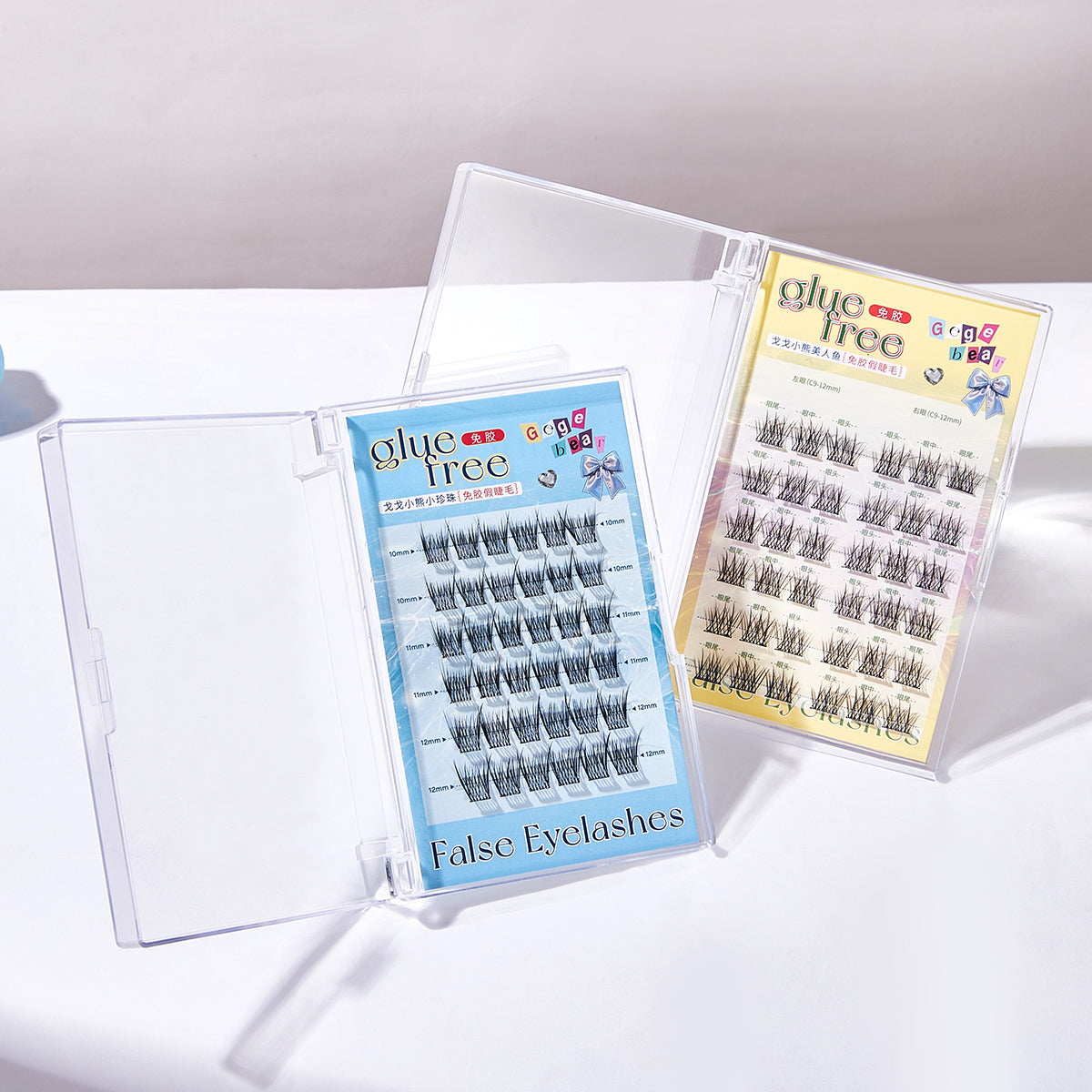 False eyelashes in clear packaging on a white background