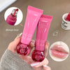 Two pink lip gloss tubes held by a hand with close-up insets of the product and lips.