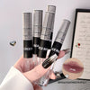 Four black and white patterned lip glosses with 'GECE BEA' branding, held by a hand.