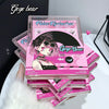 Stack of Gege Bear false eyelashes packaging on a white surface