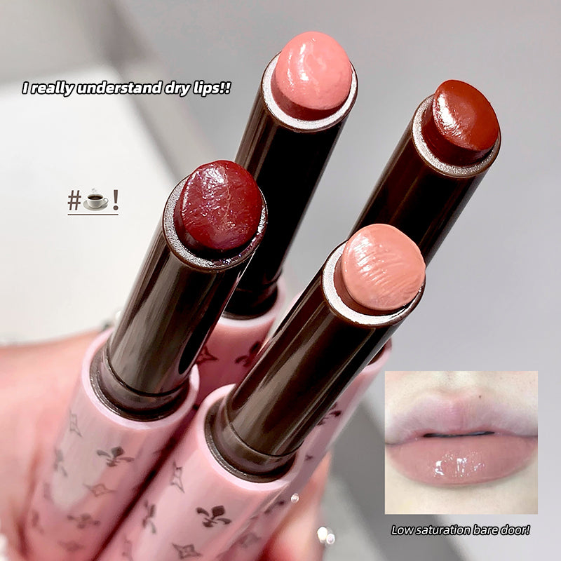 Three lipsticks with pink caps held by a hand, with text and a close-up of lips.