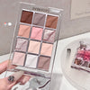 Makeup palette with various shades held by a hand, brand 'GEGEBEAR' visible.
