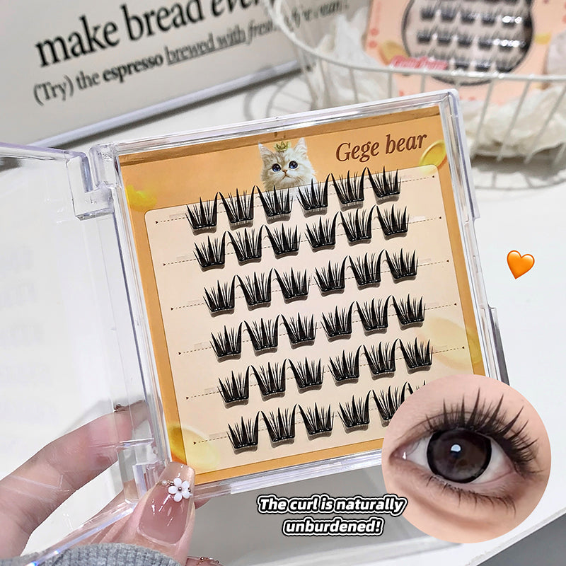 Set of false eyelashes with a 'Gege bear' label, held by a hand, with an inset of an eye wearing the lashes.
