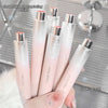 Set of GEUGEUEUL lipsticks with snowflake electroplating design held by a hand.