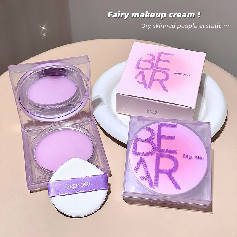 Makeup cream with 'Geege bear' packaging on a beige surface