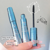 Blue mascara with a hand holding it against a neutral background