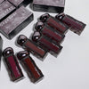 Gege bear lip products with packaging on a light gray background
