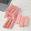 Pink lip products with 'Gege Bear' branding on a light background
