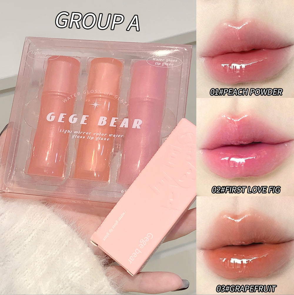 Pink lip gloss set with packaging and close-up of lips wearing the product.