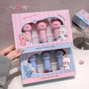 Two sets of pink and blue bear-shaped lip masks in packaging with cartoon bear illustrations.