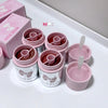 Pink and silver containers with GECE BEAR branding on a white surface.