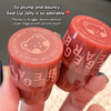 Two red lip jelly containers with visible text and branding, held by a person.
