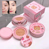 Pink cosmetic compact with bear design on a white surface