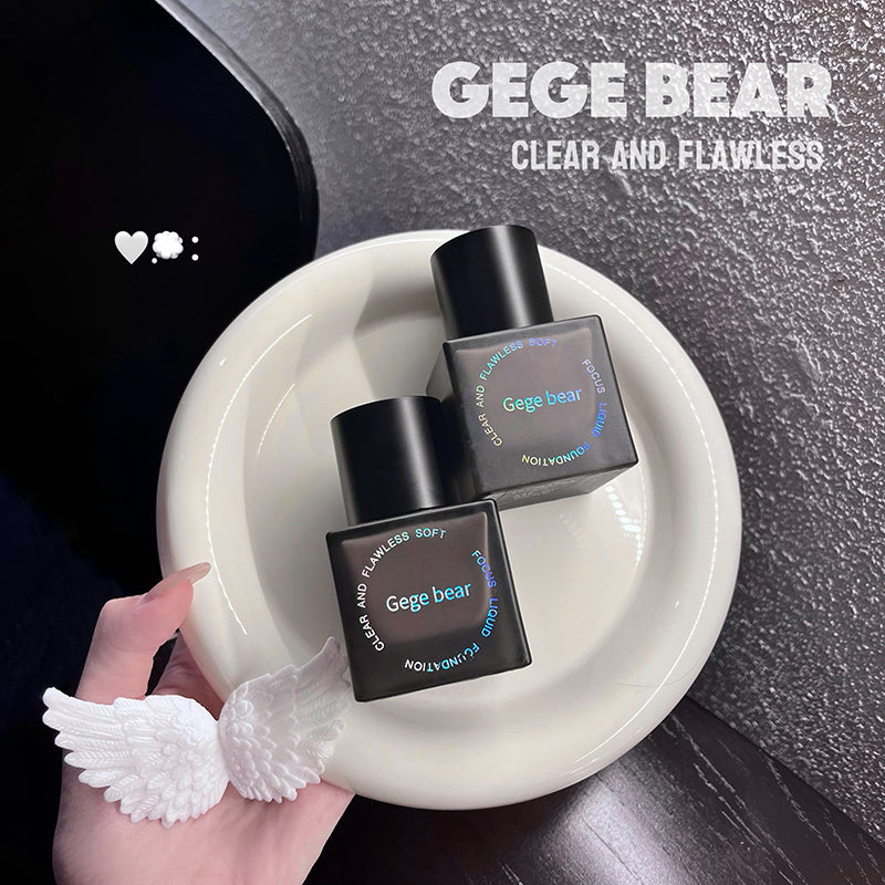 Three 'GEGE BEAR' skincare products on a white plate with a hand holding angel wings, against a dark background.