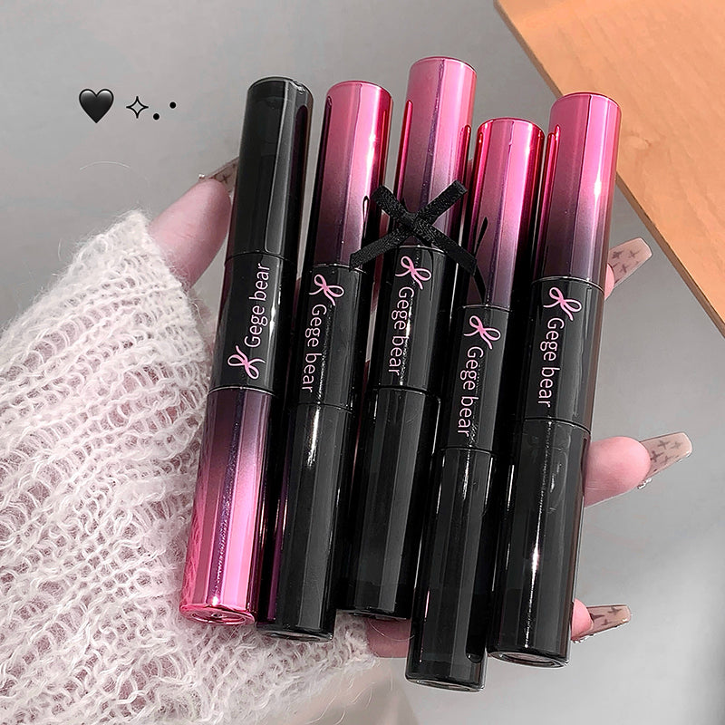 Set of Gage Bear lip products held by a person wearing a lace garment.