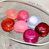 Colorful small containers on a metal grid with 'Gee Bear' branding.
