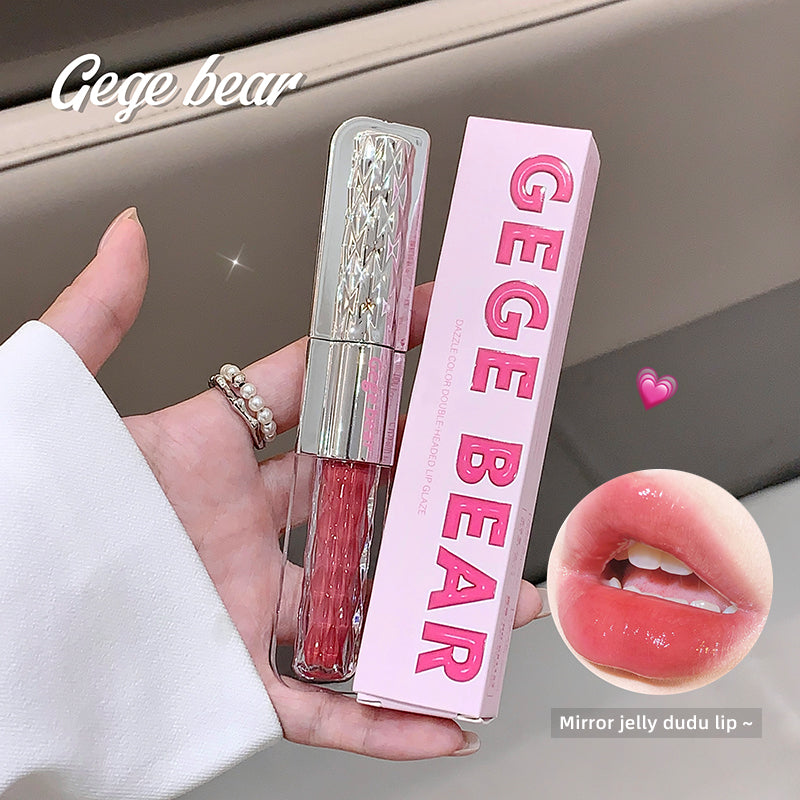 Lip gloss with pink packaging labeled 'Gege Bear' held by a hand.