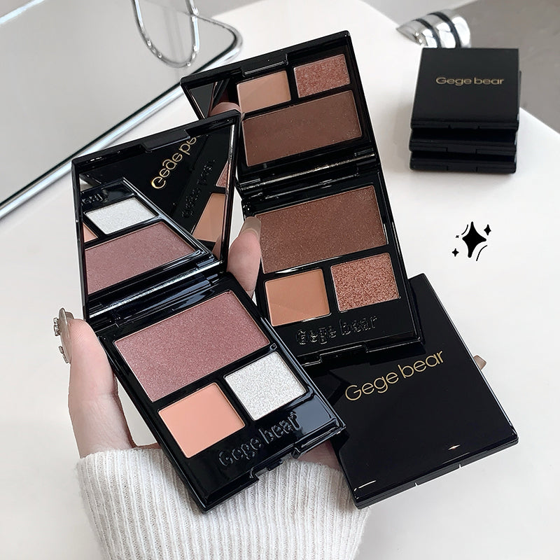 Makeup palette with Gegebear branding held by a hand on a white surface.