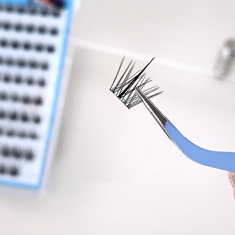 Eyelash extension tool with a close-up of false eyelashes on a white background