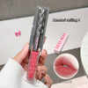 Lip gloss with decorative packaging held by a hand, GEGE BEAR brand visible