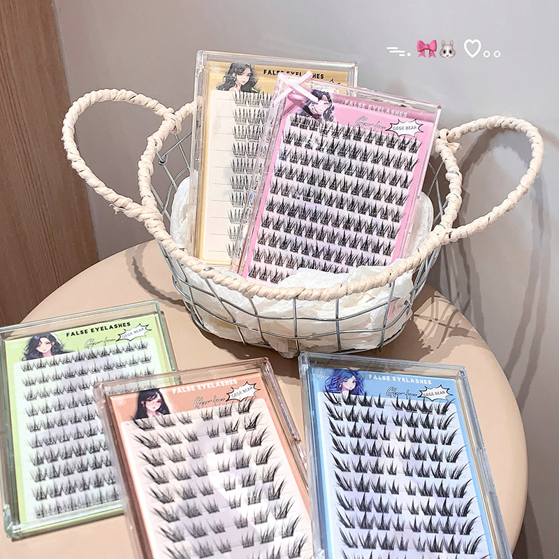 Basket and trays of false eyelashes on a table