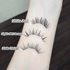 Three pairs of false eyelashes labeled 'Little Fox', 'Light Girl Group', and 'Plain Water' on a person's arm.