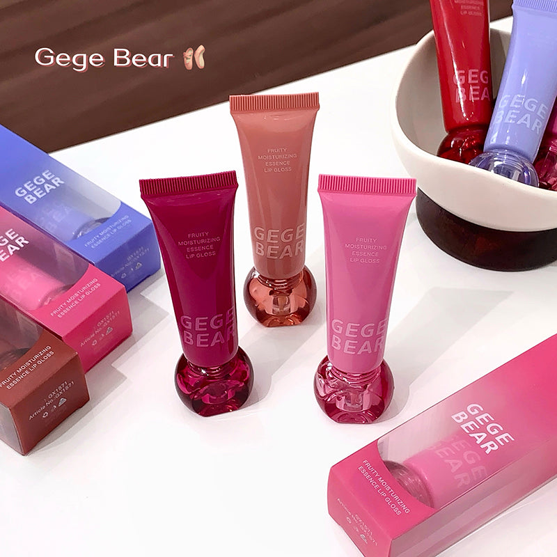 Gege Bear lip gloss products on a white surface with visible branding.