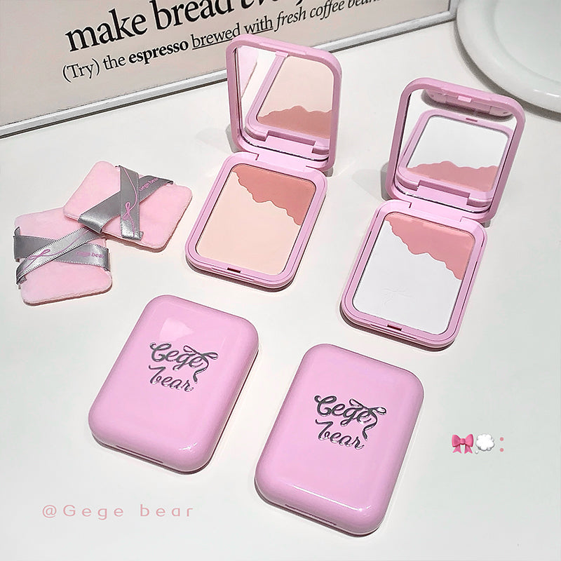 Pink makeup compact with a gradient shade on a white surface, branded 'Gege bear'.