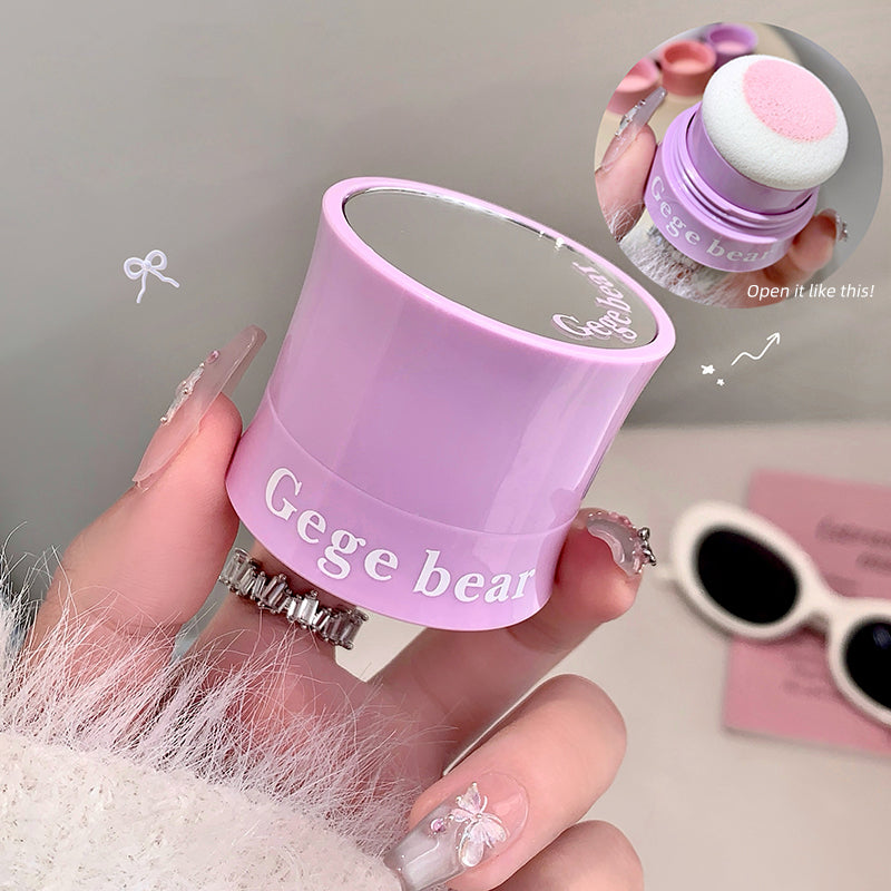 Purple container with 'Gege bear' branding held by a hand, with a small inset showing the product.